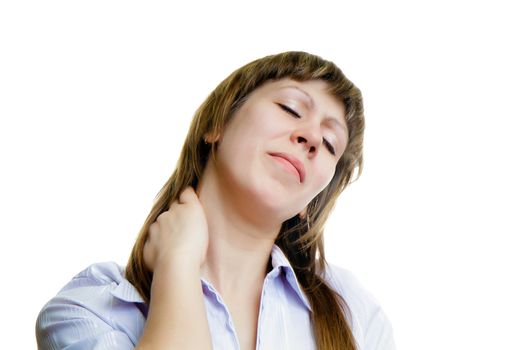 Young girl massaging sore neck on a white background