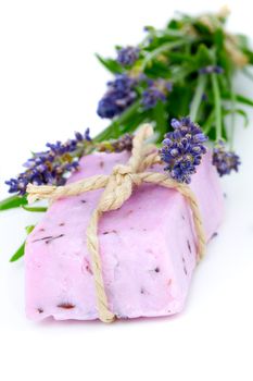 Lavender soap and lavender flower, isolated on white background