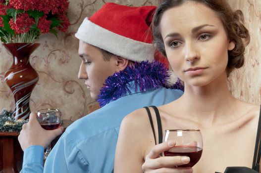 A pair of young and beautiful people are going through a fight on Christmas Eve