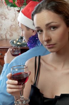 A pair of young and beautiful people are going through a fight on Christmas Eve