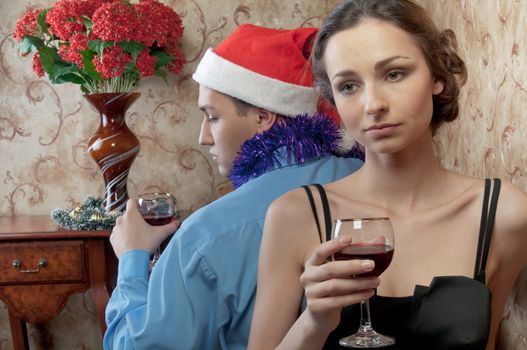 A pair of young and beautiful people are going through a fight on Christmas Eve