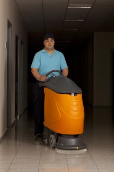 cleaning floor with machine