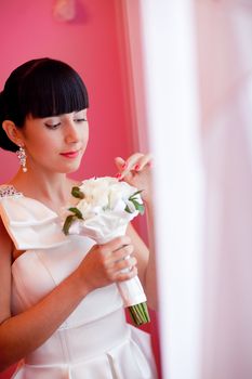 bride playing with flying veil