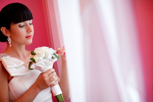 bride playing with flying veil