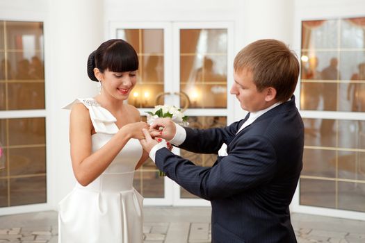 putting on a wedding ring