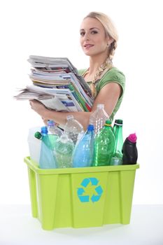 Woman recycling