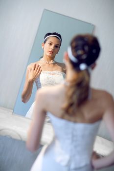 face of the bride in the mirror