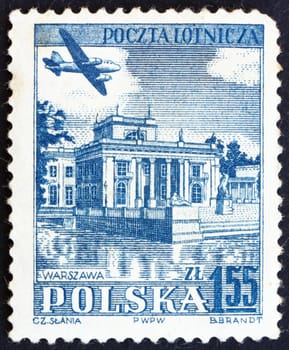 POLAND - CIRCA 1957: a stamp printed in the Poland shows Plane over Lazienki Park,Warsaw, circa 1957