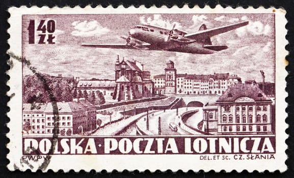 POLAND - CIRCA 1952: a stamp printed in the Poland shows Plane over Warsaw, circa 1952