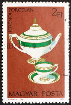 HUNGARY - CIRCA 1972: a stamp printed in the Hungary shows Teapot, Cup and Saucer, Herend Porcelain, circa 1972