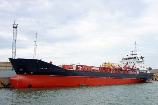 The tanker is moored in the port 