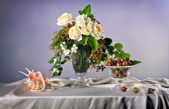 Still life with white roses  and fresh gooseberry