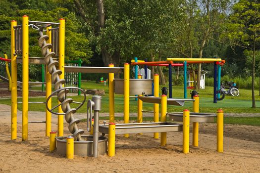 Sand and water playground for children in public park in summer - horizontal 