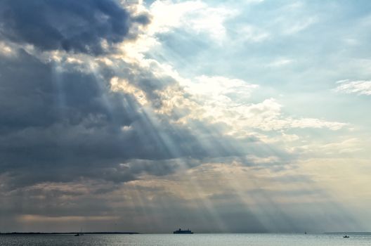 A spectacular view of sunbeams coming through the clouds