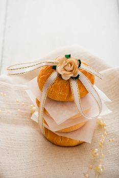 Vanilla cookies as present on napkin and white table