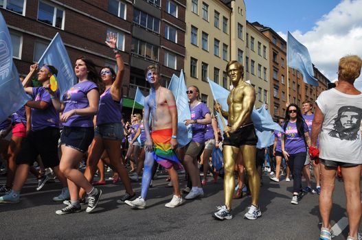 STOCKHOLM, SWEDEN. AUGUST 4. Stockholm Pride. Proud golden man in the parade  Stockholm Pride july 31 - august 5, 2012