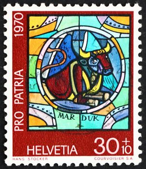 SWITZERLAND - CIRCA 1970: a stamp printed in the Switzerland shows Bull, Assyrian God Marduk, by Hans Stocker, Contemporary Stained Glass Window, circa 1970