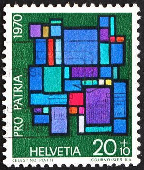 SWITZERLAND - CIRCA 1970: a stamp printed in the Switzerland shows Abstract Composition, by Celestino Piatti, Contemporary Stained Glass Window, circa 1970