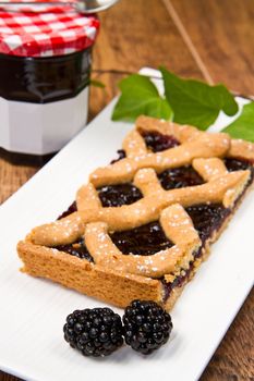 blackberry tarte on wooden table