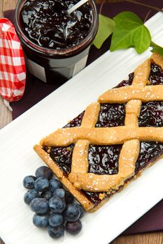 blueberry tarts on wooden table