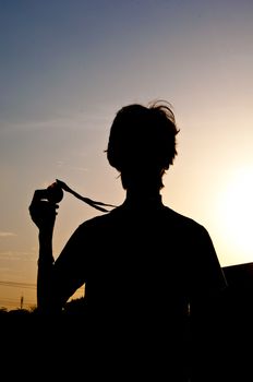 silhouette of man with medal prize