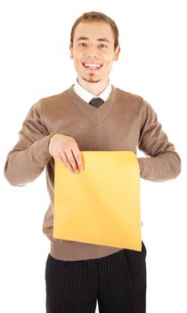 Young well-dressed man in formalwear is holding a open yellow envelope. Isolated on white background.