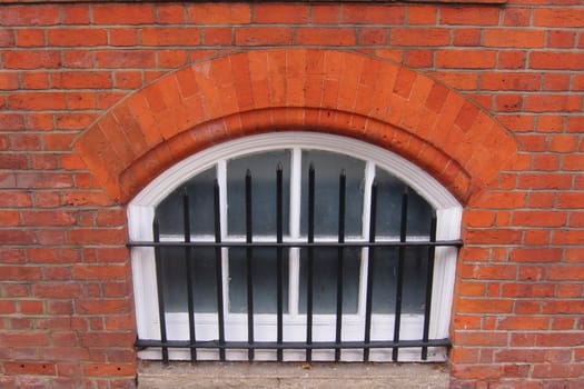 Victorian cellar window with grate