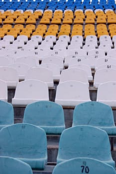 Sitting at stadium.