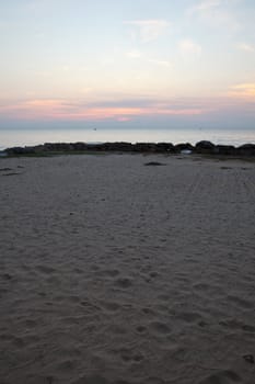 The beach is a beautiful seaside sun goes down