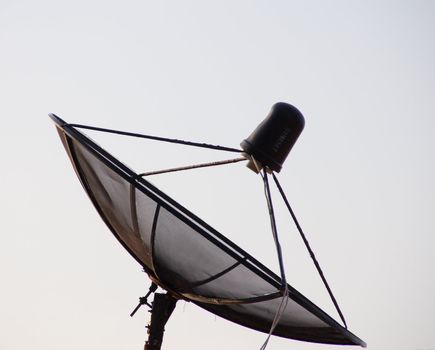 A large black satellite dish