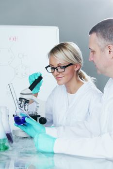 Chemistry Scientist conducting experiments in laboratory