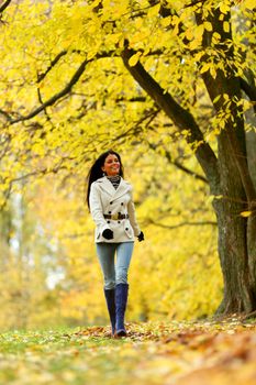  woman in yellow autumn park