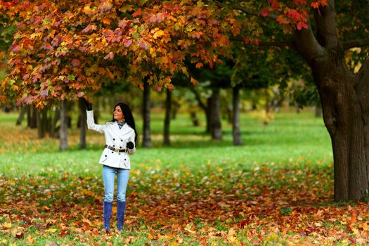  woman in yellow autumn park