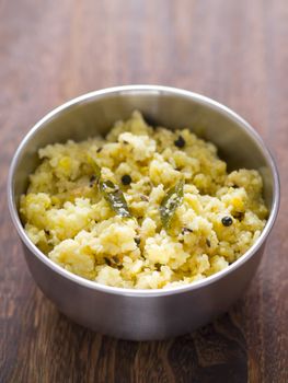 close up of a bowl of indian pongal