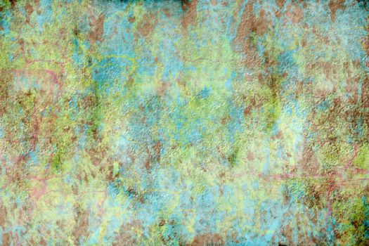 A rough, textured green and blue grunge background  with copy space