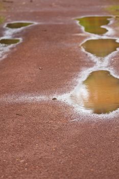 The gravel roads in rural areas, wet look