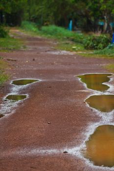 The gravel roads in rural areas, wet look