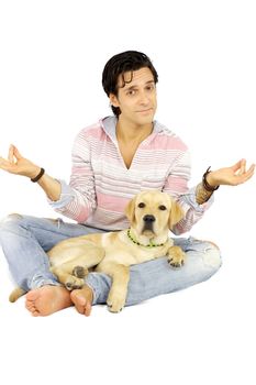 Happy man with happy puppy labrador dog smiling in yoga position