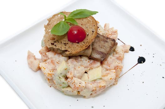 salad, fish and eggs decorated with greens and tomatoes