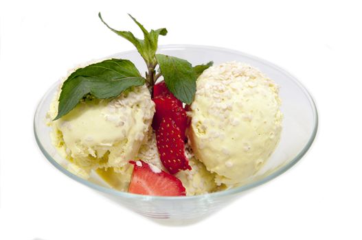 ice cream decorated with strawberries and mint