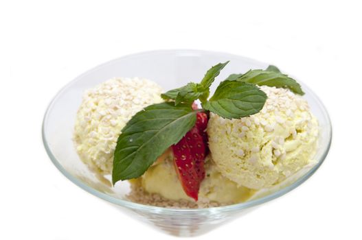 ice cream decorated with strawberries and mint