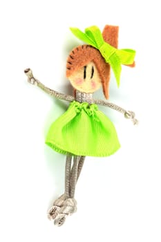 ballerina doll craft made ​​with felt cloth and vertical strings on white background