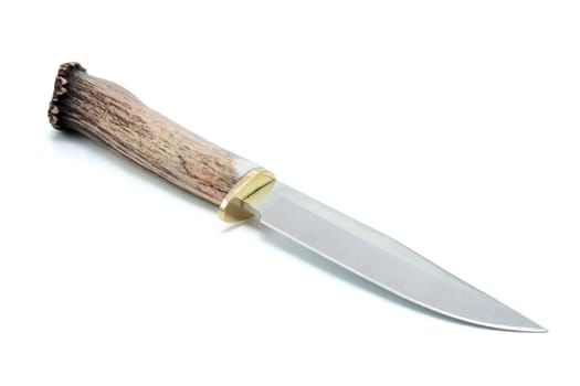 Sport hunting knife handle of deer horn on white background