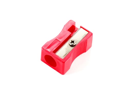 red plastic sharpener on a white background