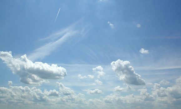 white clouds on blue sky