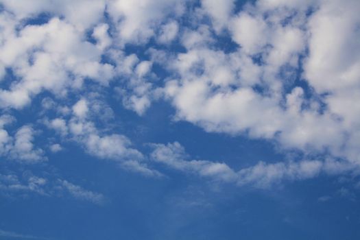 white clouds on blue sky