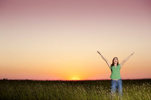 Outdoor portrait of a woman on a meadow releaxing