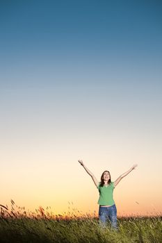 Outdoor portrait of a woman on a meadow releaxing