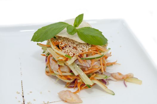 vegetable salad with oil on a white background