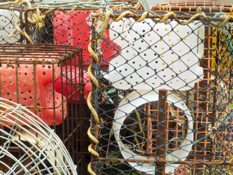 Closeup of stacked lobster basket traps for catching crab and lobster in the ocean